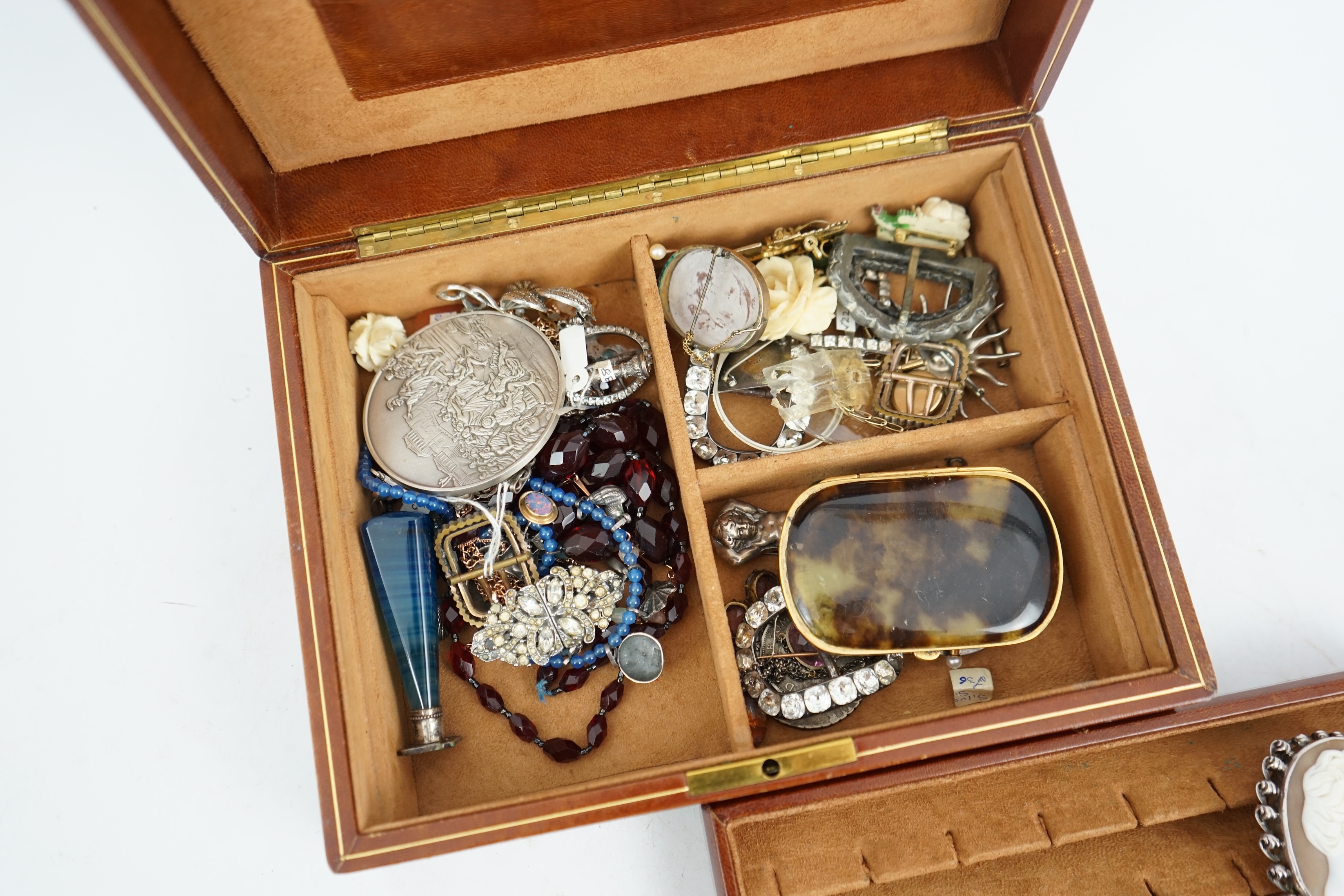 A quantity of 19th century and later jewellery and other collectables, including paste set buckles, agate mounted seal, tortoiseshell purse, Victorian figural seal, coins, 9ct ring, loose stones, cameo shell brooches, et